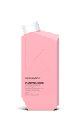 Pink bottle of Kevin Murphy Plumping Rinse on a white background
