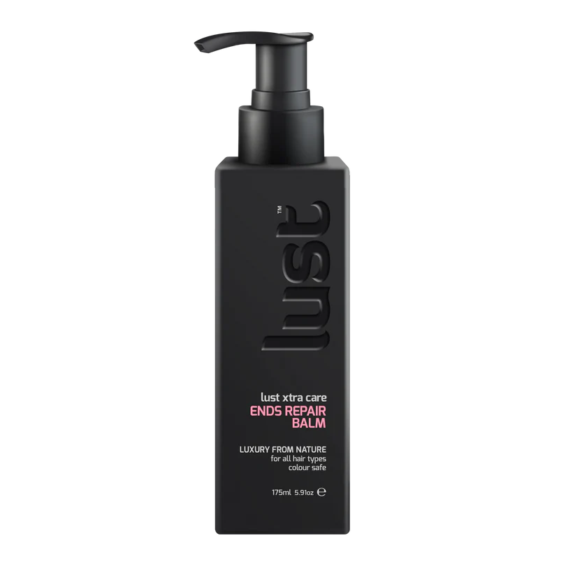 Black bottle of 'lust' ends repair balm on a white background