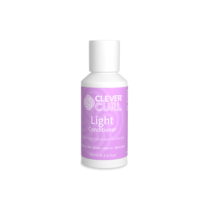 Clever Curl Light Conditioner bottle on a white background