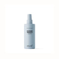 Keune Ocean Waves Texture Spray in a Blue spray Bottle 