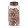 Clear jar with brown hair extensions labeled 'Angel Provence' on a white background