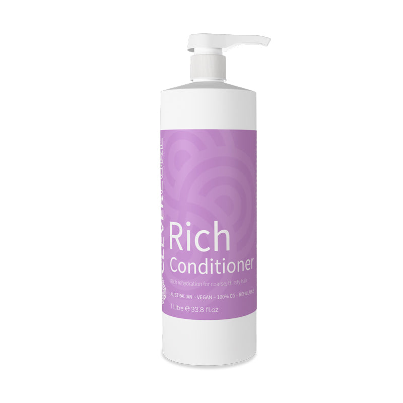 White bottle of Rich Conditioner with a purple label on a white background