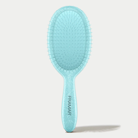 Light blue hairbrush with 'Framar' branding on a white background