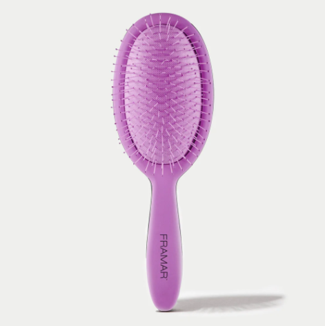 Purple hairbrush with 'Framar' branding on a white background