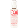 Bottle of Miracle Hair Treatment with red text on a white background