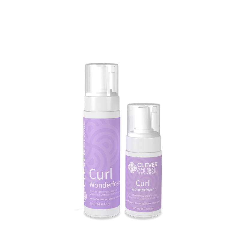 Two bottles of Curl Wonderfoam by Clever Curl on a white background