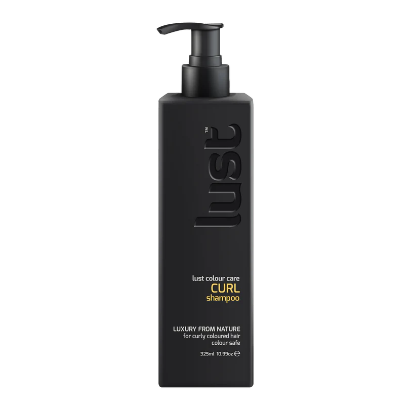 Black shampoo bottle with pump labeled 'lust' on a white background