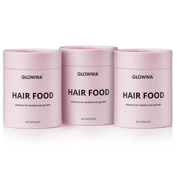 Three containers of GLOWWA Hair Food on a white background