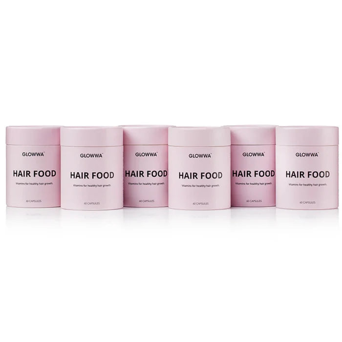 Row of GLOWWA HAIR FOOD containers on a white background
