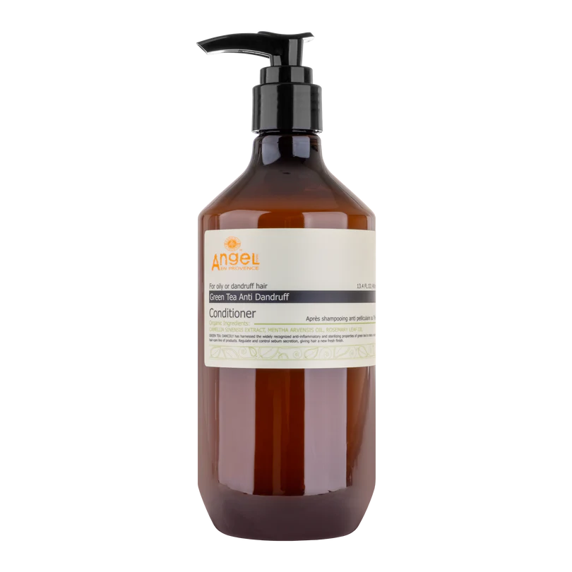 Brown conditioner bottle with pump on a white background