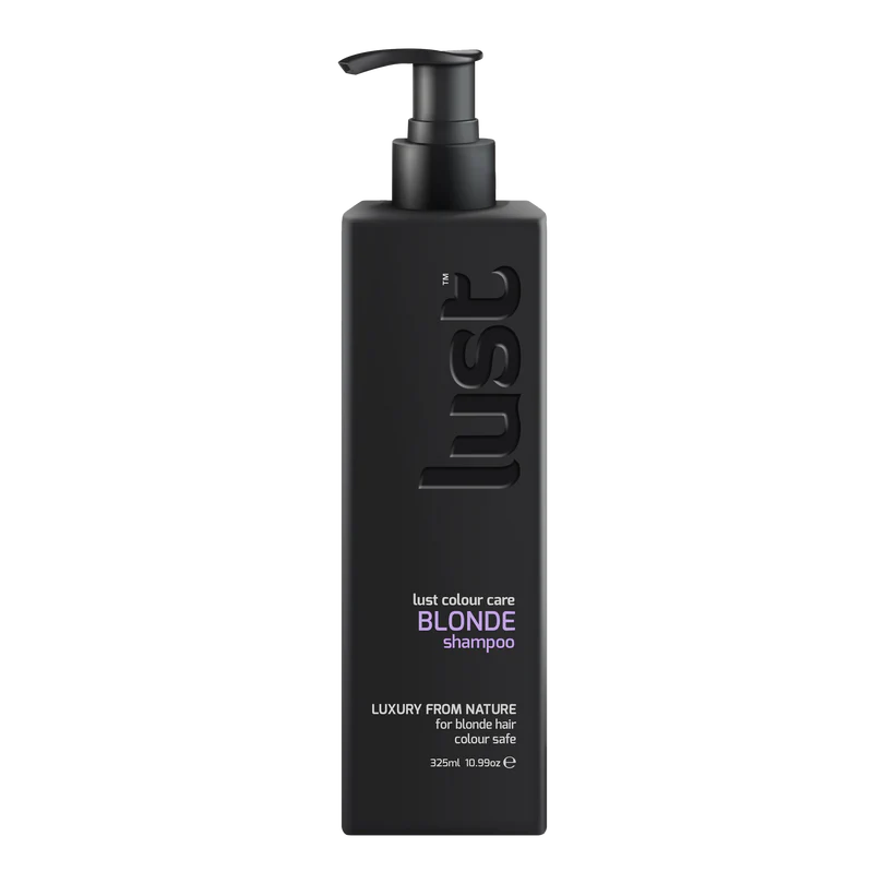 Black shampoo bottle with pump labeled 'lust' on a white background
