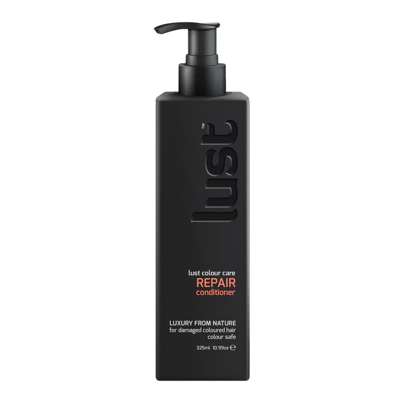 Black hair care bottle with pump labeled 'lust' on a white background