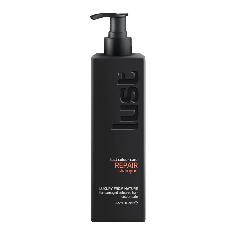 Black shampoo bottle with pump labeled 'lust' on a white background