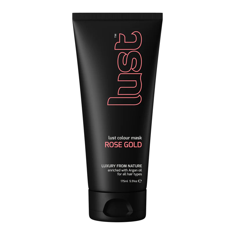Black tube of 'lust' rose gold color mask on a white background