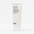 White tube of 'shape vixen' volumizing lotion by evo on a white background