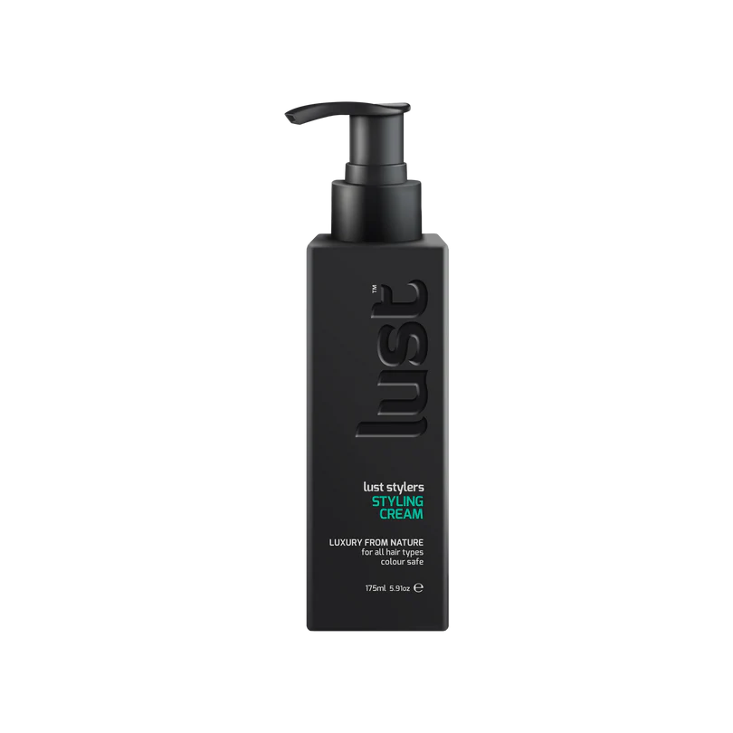 Black bottle of lust styling cream on a white background